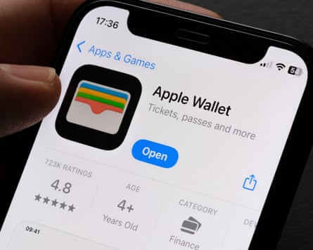A smartphone shows the Apple digital wallet icon