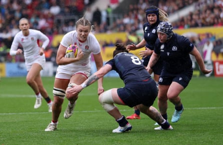 Alex Matthews of England is tackled by Jade Konkel of Scotland