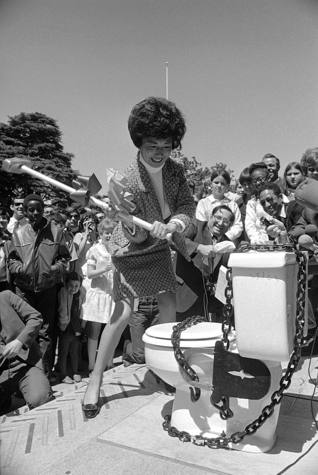 Assemblywoman March Fong breaks a porcelain potty with a sledgehammer on the steps of the Capitol in Sacramento, California, April 26, 1969.
