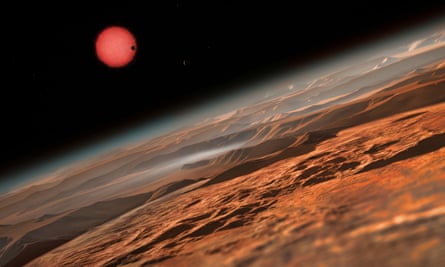 Another artist’s impression of an imagined view from close to the surface of one of the three planets. In this view one of the inner planets is seen in transit across the disc of its tiny and dim parent star.