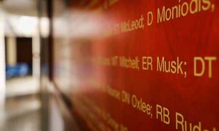‘ER Musk’ on a corridor’s red wall among other names written in yellow