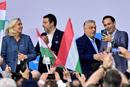 Viktor Orban, French far-right leader Marine Le Pen, Italy's deputy Prime Minister and Minister of Infrastructure and Transport Matteo Salvini, and Leader of Belgium's Vlaams Belang party Tom Van Grieken attend the so-called "Patriots' Grand Assembly" of nationalist groups from Europe, in Budapest, Hungary, 23 March 2026.