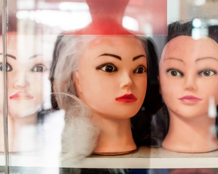 The heads of sex dolls in a factory.