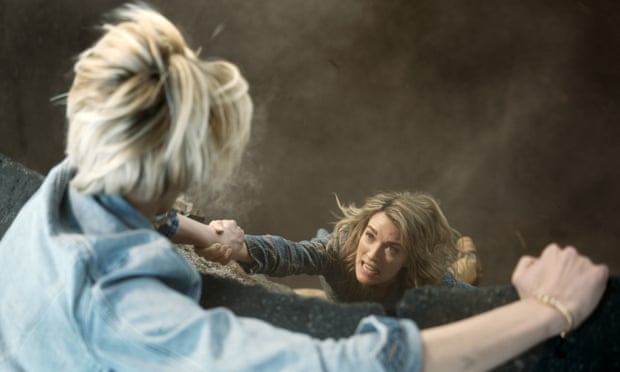 Plot hole … Izzy Harris (Zyra Gorecki) tries to hang on to her desperate mother ( Natalie Zea) at the edge of the sinkhole.