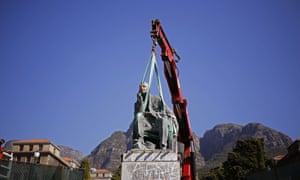 A crane prepares to remove the statue of Cecil Rhodes from its plinth at the University of Cape Town, in April.