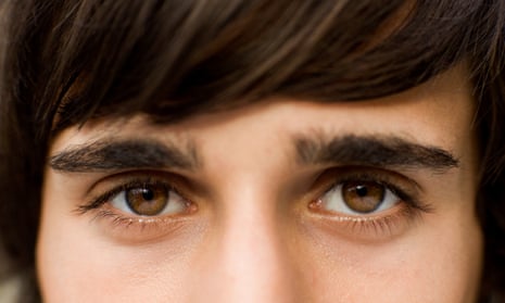 Man's face showing eyebrows and eyelashes