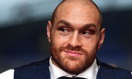Tyson Fury at a press conference in Bolton after winning the title fight.