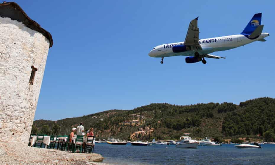 A Thomas Cook holiday charter jet prepares to land on Skiathos