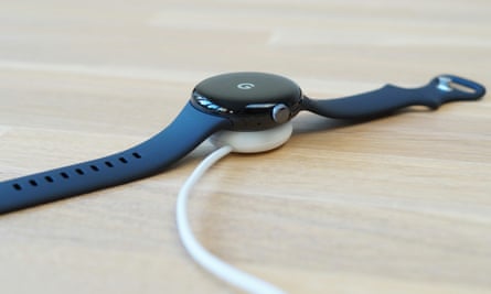 The Pixel Watch on its magnetic charging puck.