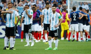 Lionel Messi and his team-mates look dejected after the match.