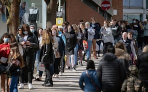 Shoppers queue