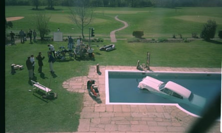The cover of the album Be Here Now featured a Rolls-Royce in a swimming pool