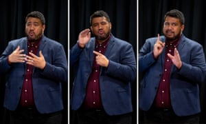 Alan Wendt signs during a post cabinet press conference at Parliament on June 4, 2019 in Wellington, New Zealand.