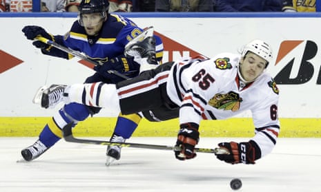 Andrew Shaw is sent flying after colliding with St Louis Blues’ Scottie Upshall during the Blackhawks Game 7 loss