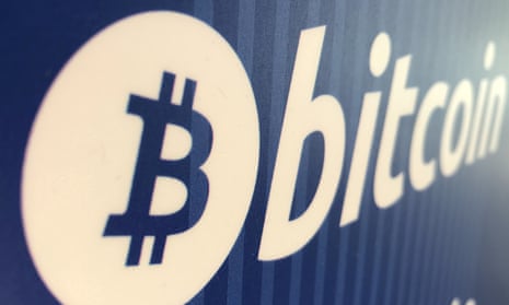 A bitcoin logo is seen on a cryptocurrency ATM in Santa Monica, California, US.