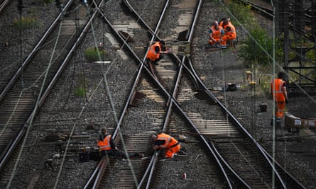Workers repair Deutsche Bahn tracks at Hagen