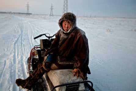 Reindeer herder Simyon travels by sled from his chum towards Vorkuta to buy supplies. Construction of gas pipelines and industrial complexes is threatening the herders’ way of life, forcing them to travel further afield in search of pastures. Vorkuta is a coal mining and former Gulag town 1,200 miles north east of Moscow, beyond the Arctic Circle, where temperatures in winter drop to -50C. Here, whole villages are being slowly deserted and reclaimed by snow, while the financial crisis is squeezing coal mining companies that already struggle to find workers.
