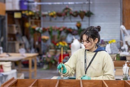 Sarah Ray-Dobson, an apprentice prop maker, at work at the National Theatre in London.