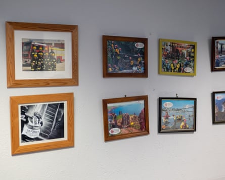Framed pictures on the wall of the station.