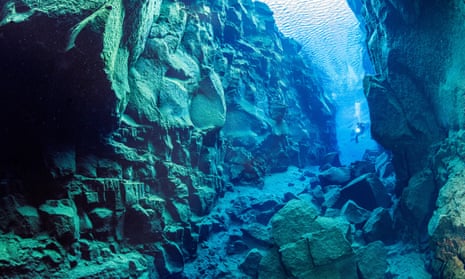 neon green algae troll hair in silfra lagoon