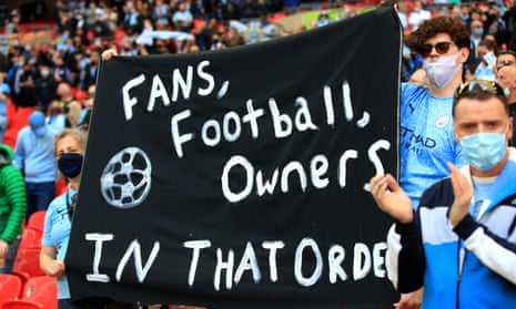 Manchester City fans display a banner before the Carabao Cup final against Tottenham in April.