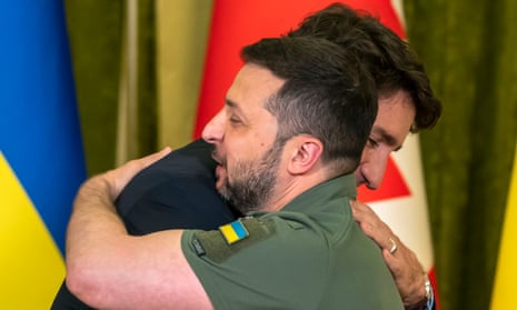Justin Trudeau hugs Volodymyr Zelenskyy during a meeting in Kyiv.