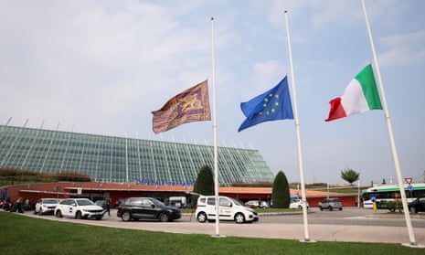 Flags are seen at half mast outside Dell'Angelo hospital, where some injured people were taken after a coach crashed off an overpass in Mestre, near Venice, Italy, October 4, 2023.