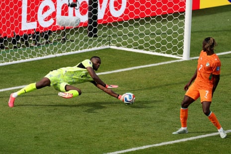 Yahia Fofana gets down brilliantly to save a shot by Nadiem Amiri.