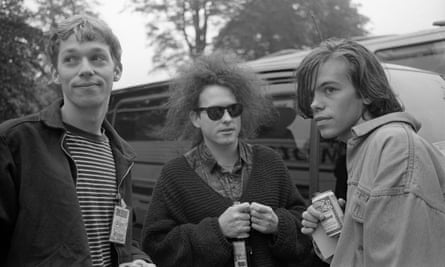 Bell and Mark Gardener of Ride drink beer with Robert Smith of The Cure in 1991.