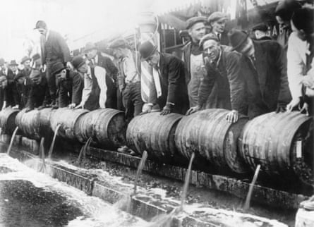 Barrels of beer emptied into the sewer by authorities during prohibition, 1920