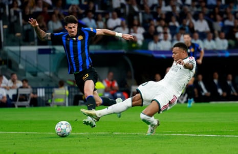Real Madrid's Kylian Mbappe scores their first goal.