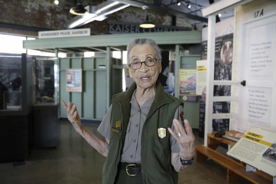 Betty Reid Soskin stands among second world war exhibits in the visitors center of the national park.