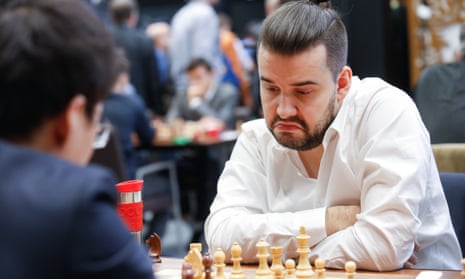 Ian Nepomniachtchi of Russia competes with Yu Yangyi of China in 2018