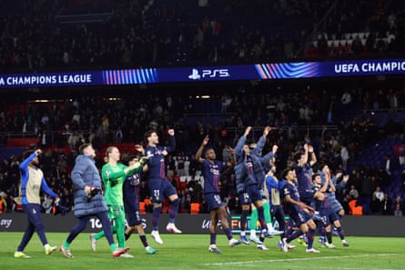 Paris Saint-Germain players celebrate at the end of their 2-2 draw with Monaco, having progressed 5-4 on aggregate