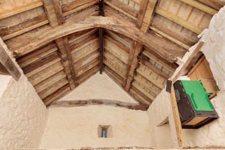 The intricate oak roof and the owl nesting box