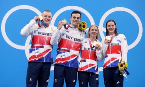 Gold medalists Adam Peaty, James Guy, Anna Hopkin and Kathleen Dawson of Team Great Britain after the mixed 4x100m medley relay final at the Tokyo 2020 Olympic Games.