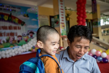Ho Duc Luc collects his son from school in Lộc Bổn commune, Phú Lộc district.