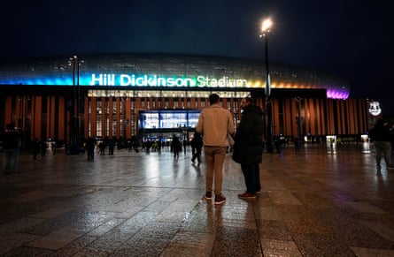 Fans arrive ahead of a Premier League match at Hill Dickinson Stadium.