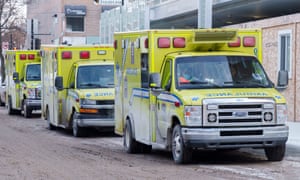 A row of ambulances is seen outside a hospital in Montreal, on Monday, 10 January, 2022.