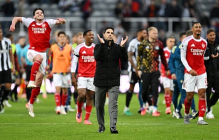 Mikel Arteta applauds the fans on the pitch at St James’ Park
