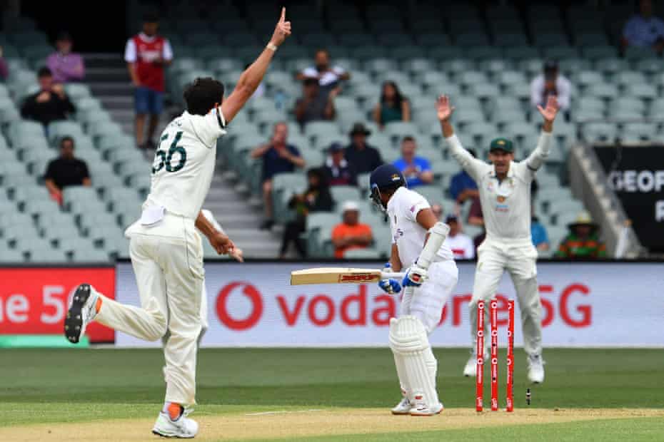 Mitchell Starc celebrates after taking Prithvi Shaw’s wicket in Adelaide last December.