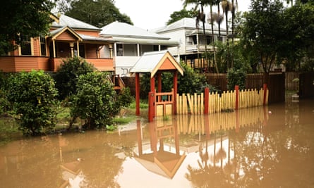 Flood waters rise in front of a house in Lismore, New South Wales.