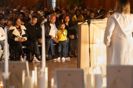 Members of Adams’s family, including his father, Juanito (centre left), and mother, Candice (centre right), at his memorial service last week.
