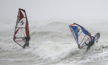 Windsurfers take advantage of the storm force winds off the coast of West Sussex.