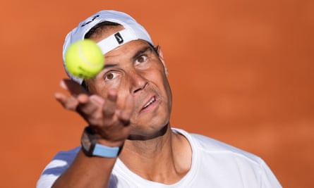 Rafael Nadal serves