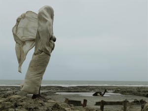 Widow Kanaklata Das looks out to sea on Sagar Island, one of the many affected by sea-level rise in the Sundarbans.