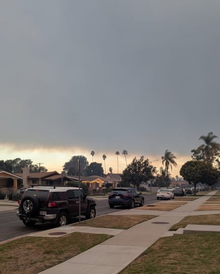 smoke over a quiet neighborhood