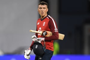 Tom Banton of England walks off after being dismissed.