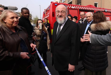 The Chief Rabi of the United Hebrew Congregations of the Commonwealth Ephraim Mirvis speaks to reporters at the scene of an arson attack on a Jewish ambulance service in London, Britain, 23 March 2026.