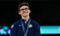 A US gymnast who is Stephen Nedoroscik smiles while standing on the Olympics podium